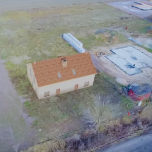 Model domu w 3D nałożony na rzeczywiste zdjęcia z powietrza w celu wykonania wizualizacji.